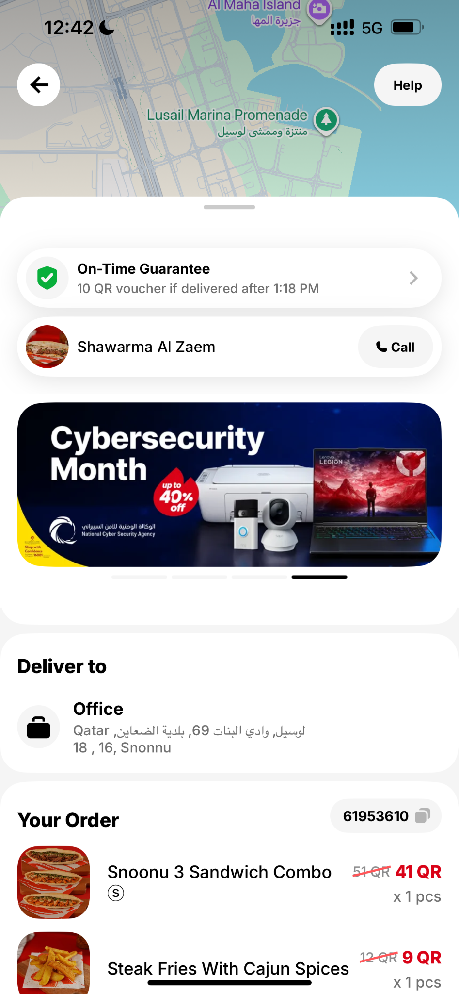 Snoonu app checkout screen showing a promotional banner during order tracking
